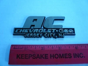 Emblema de placa de identificación geográfica AC Chevrolet guión concesionario publicidad - Imagen 1 de 2