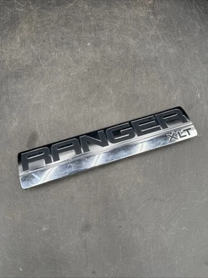 06 07 08 09 10 11 FORD RANGER XLT GUARDABARROS LATERAL EMBLEMA LOGOTIPO INSIGNIA SÍMBOLO USADO OEM Foto 1 de 4