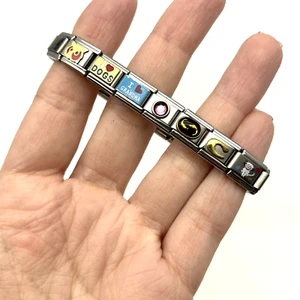 Pulsera italiana vintage años 00 D'linQ elástica 17 eslabones 7 dijes millennial - Imagen 1 de 6