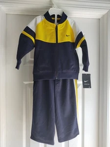 Neu mit Etikett Nike Baby Kleinkind 2-teilig Jacke + Hose Trainingsanzug 18-24M blau gelb - Bild 1 von 17