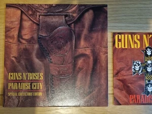 GUNS N' ROSES - PARADISE CITY 7" LIMITED EDITION HOLSTER SLEEVE GEFFEN - Picture 1 of 11