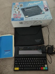 NOTEPAD AMSTRAD NC150 - ANLEITUNG + ETUI - Bild 1 von 8