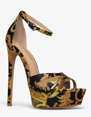 Tyronica de SHOEDAZZLE, Plataformas de aguja de 6,5" con estampado negro y tiras satinadas talla 12 Foto 1 de 4