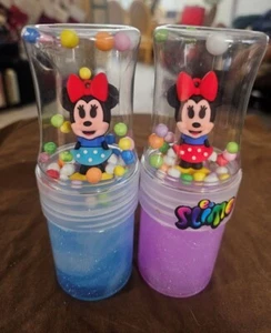 Un set di 2 personaggi Disney Minnie in scatola con melma scintillante. - Foto 1 di 5