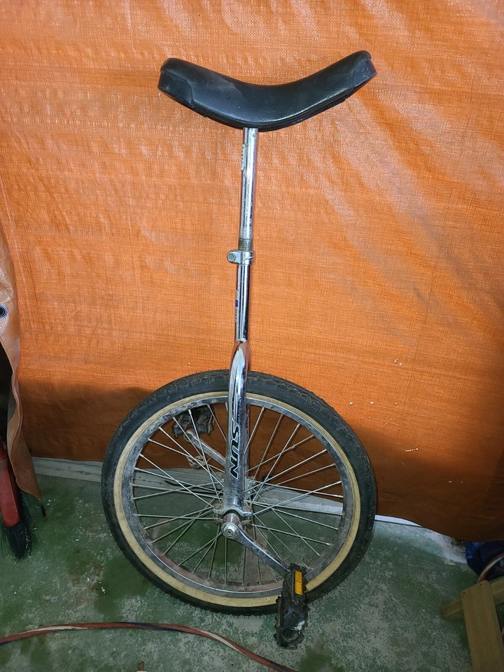 24" sun unicycle used silver adjustable seat - Image 1 of 4