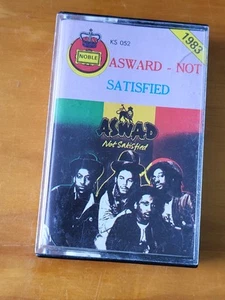 1983 Aswad - Not Satisfied Tape Cassette REGGAE Jams Music - Bild 1 von 5