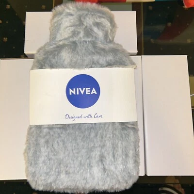 BOTELLA DE AGUA CALIENTE 0,5 L CON FUNDA POLAR - Caucho Natural - Nivea  Foto 1 de 4