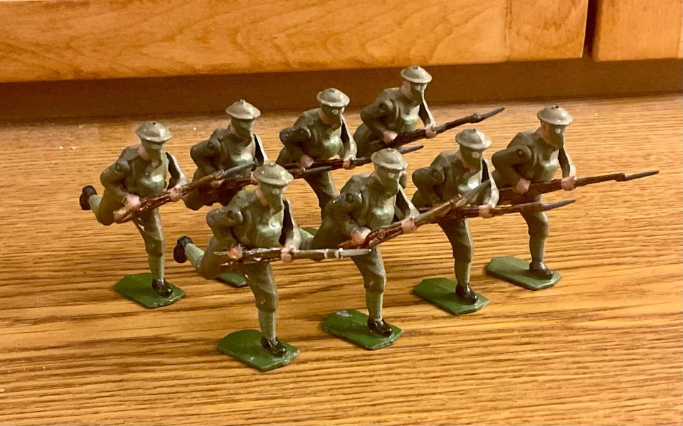 VINTAGE BRITIANS  BRITISH INF. IN GAS MASKS CHARGING - image 1 of 1