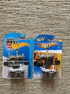 JUEGO DE 2 HOT WHEELS 2012-14 HW CITY MARS ROVER CURIOSITY variantes negras y sucias - Imagen 1 de 9