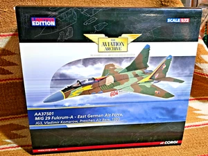 🔥 CORGI AVATION AA37501 MIG 29 FULCRUM A E. GERMANY Vladimir KOMAROW 🔥NuInBOX! - Picture 1 of 14