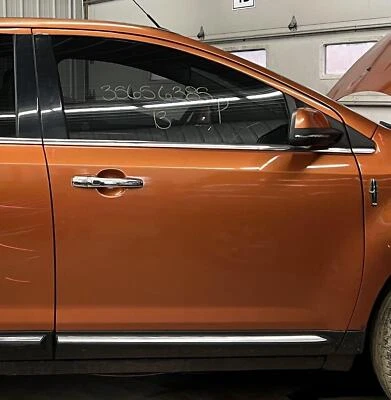 Lincoln MKX 2011-2015 pasajero derecho puerta delantera pintada naranja Foto 1 de 4
