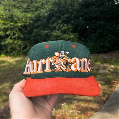 Gorra gorra vintage Miami Hurricanes espalda a presión NCAA fútbol verde naranja logotipo 7 años 90 Foto 1 de 4