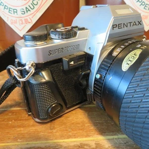 Pentax Super Program 35mm SLR 35mm Film Camera with Tokina 28-200mm Zoom Lens - Picture 1 of 16