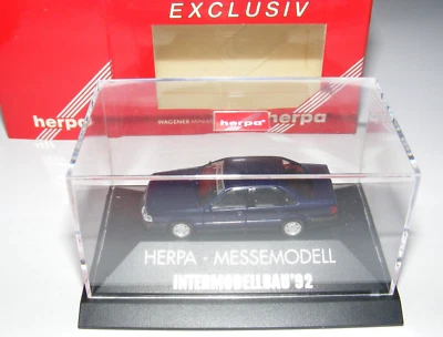 Herpa 1:87 HO Plastik Modellauto Audi V8 Messemodell Intermodellbau ' 92 1992 - Bild 1 von 4