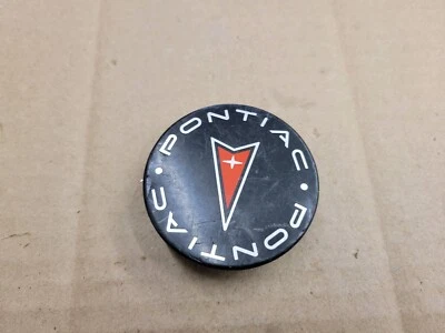 Tapacubos central Pontiac OEM 1997-2009 Aztek Bonneville Grand Am Prix 9593169 Foto 1 de 4