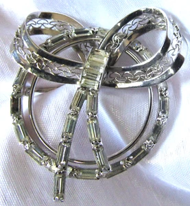 Bellissima spilla vintage in argento sterling 925 con fiocco e cerchio con strass - Foto 1 di 4