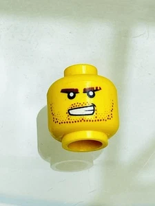LEGO Minifigure Yellow Head - brown stubble & bushy eyebrows & lopsided grin. - Picture 1 of 3
