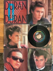 DURAN DURAN: The Reflex/New Religion 45 - 7" LIMITED POSTER SLEEVE VG+ F160 - Picture 1 of 3