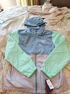 Abrigo de lluvia cortavientos Reebok para mujer nuevo con etiquetas - Imagen 1 de 16