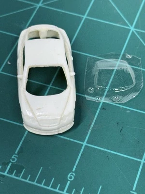 Estilo Fray/cuerpo Bat Jet se adapta a Aurora Dash Autoworld HO Slot Car Tjet Chasis Foto 1 de 4