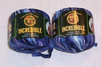 Lot of 2 Lion Brand Incredible Ribbon Yarn - Autumn Leaves, Blue Shades or Black - Image 1 of 4