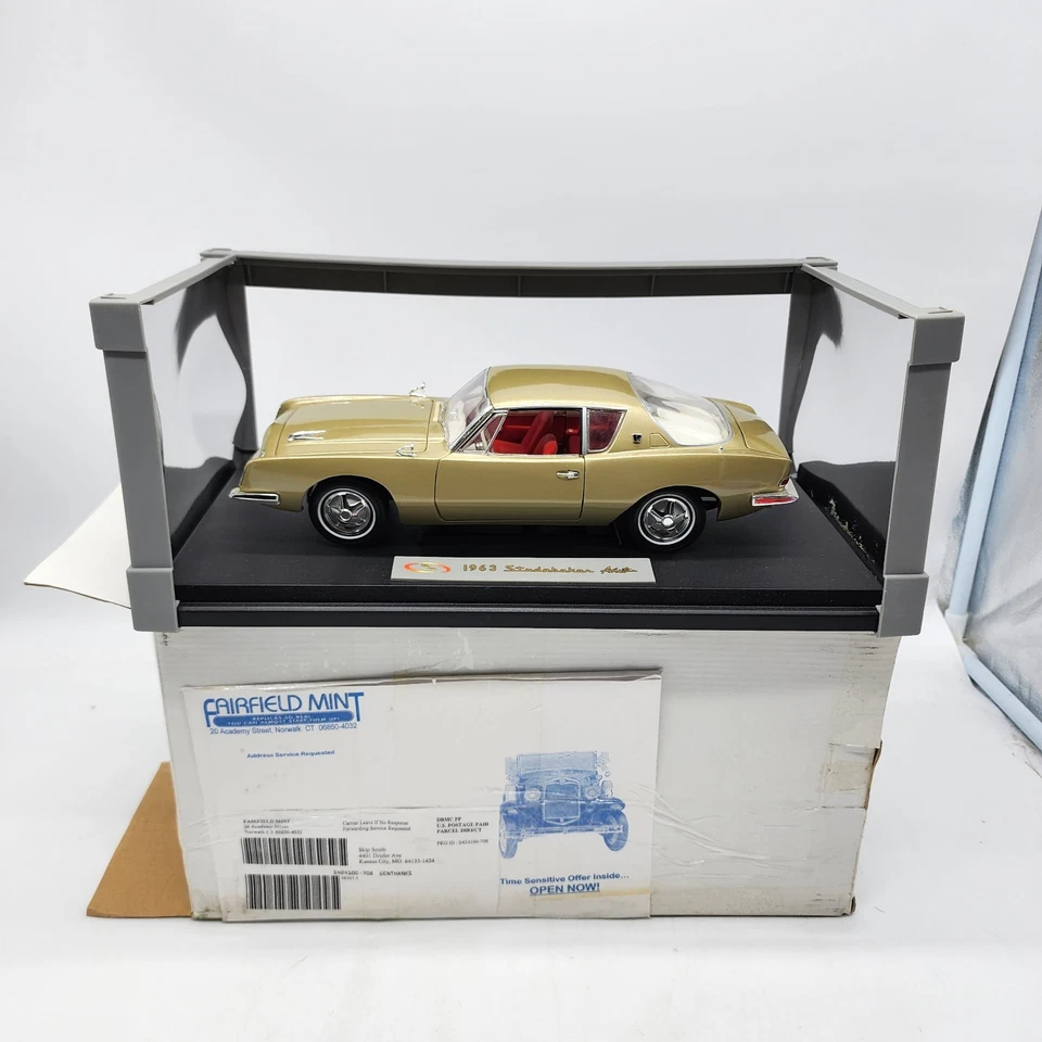 Signature Models 1:18 1963 Studebaker Avanti Gold Displayed Only w/ Base Stand - Image 1 of 4