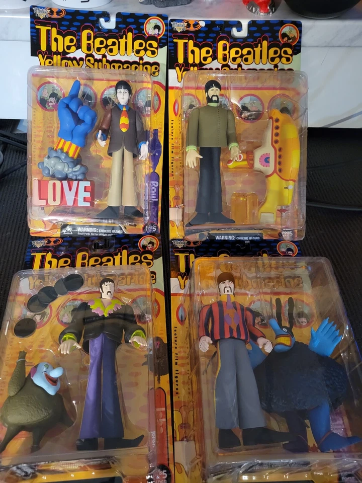 Lote de (4) figuras de acción submarinas amarillas de The Beatles McFarlane Toys NUEVO SIN USAR, EN CAJA Foto 1 de 1