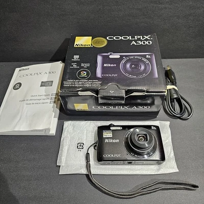 Cámara digital Nikon Coolpix A300 con caja - Manual - Cable BOTÓN PROBLEMA PARA REPUESTOS Foto 1 de 4