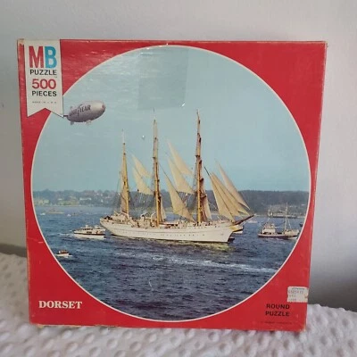 Milton Bradley Round Jigsaw Puzzle Vintage Goodyear Blimp Sailboat New Old Stock - Image 1 of 4