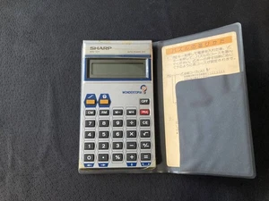 Sharp WIN-101 Puzzle Game Calculator Vintage Retro Rare Handheld - Picture 1 of 7