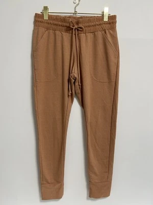 Sudaderas ajustadas soleadas Free People Movement para mujer en ocre dorado medianas Foto 1 de 4