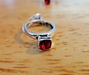 Sterling Silver 18x10mm January Red Birthstone decorated Ring Charm - Picture 1 of 5