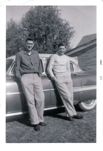 Vintage Old 1957 Photo of Two Men Man Hands in Pockets Leaning on Old Car - Picture 1 of 1