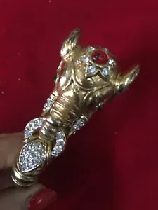 KJL Elephant Ribbed Bangle Bracelet Gold tone Rhinestone Clear/Ruby Accents - Picture 1 of 5