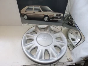 LANCIA DEDRA DEL 89 - COPRICERCHI CON LOGO DISCO 14 PZ 01 - Bild 1 von 3