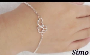 BRACCIALE DONNA UOMO BAMBINA CUORE ZAMPA CANE GATTO SCONTI REGALO COLOR ARGENTO - Imagen 1 de 1