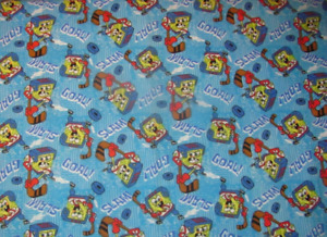18" x 28" SpongeBob SquarePants Hockey Player Goal on Tonal Blue Cotton Fabric