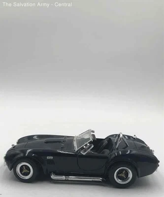 Коллекционная модель автомобиля Shelby Cobra 427S/C Road Legends черная литая 1:18 - Изображение 1 из 4