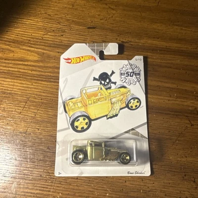 Hot Wheels 2019 50 aniversario Larry Wood Series Bone Shaker base de metal dorado Foto 1 de 4