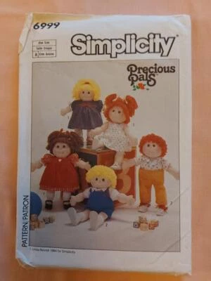 Simplicity 6999 Soft Sculptured 18" Doll & Clothes Pattern - Image 1 of 2