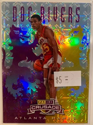 2012-13 帕尼尼十字军东征紫色/49 Doc Rivers #81 - 亚特兰大老鹰队 — 第 1/2 张图片