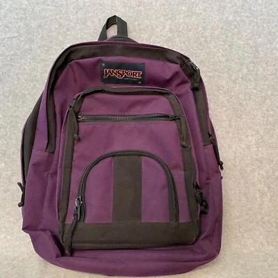 Mochila JanSport púrpura negra varios bolsillos correas acolchadas Foto 1 de 4