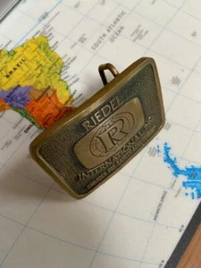 DE COLECCIÓN '83 Latón Sólido Riedel International Hebilla de Cinturón Premio Seguridad y Logro  - Imagen 1 de 4