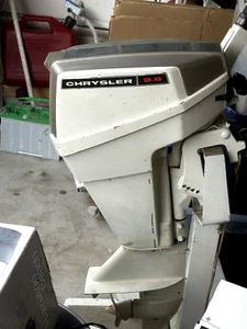 Vintage 9.9 Outboard with stand.  - Picture 1 of 5