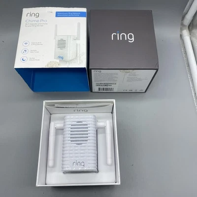 Extensor Wi-Fi Ring Chime Pro y enchufe de timbre interior. Caja abierta en pared Foto 1 de 4