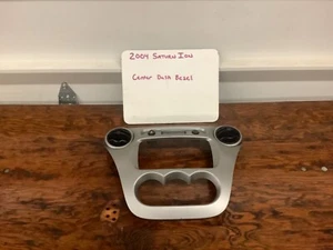 2004 SATURN ION COUPE DASH BEZEL TRIM WITH VENTS - Picture 1 of 1