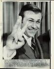 1973 Press Photo Donald Rumsfeld gives &quot;three&quot; sign at the White House.