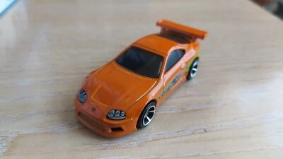 HOT WHEELS - TOYOTA SUPRA   FAST FURIOUS  ORANGE      LOOSE  1/64 *NEW* - Image 1 of 4