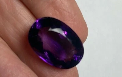 GENUINE AMETHYST OVAL FACETED GEM18.56 CTS 21.5 MM X 14.6 MM  BELOW WHOLESALE - Image 1 of 4