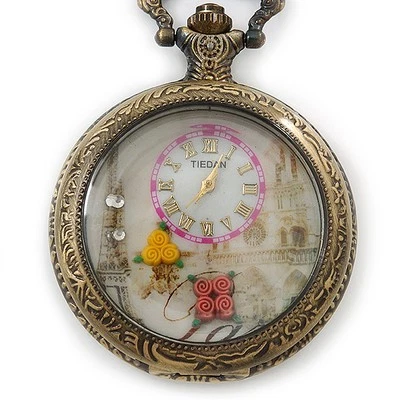 Antiguo Reloj Bolsillo Colgante Torre Eiffel Tono Bronce y Motivo Flor Cuarzo Foto 1 de 4